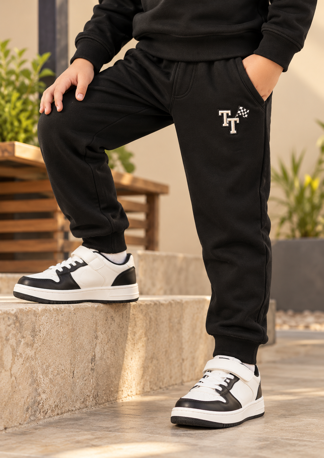 Trendy Tribe Kids’ Jet Black Trouser with Contrast Ivory Racing Flag Emblem