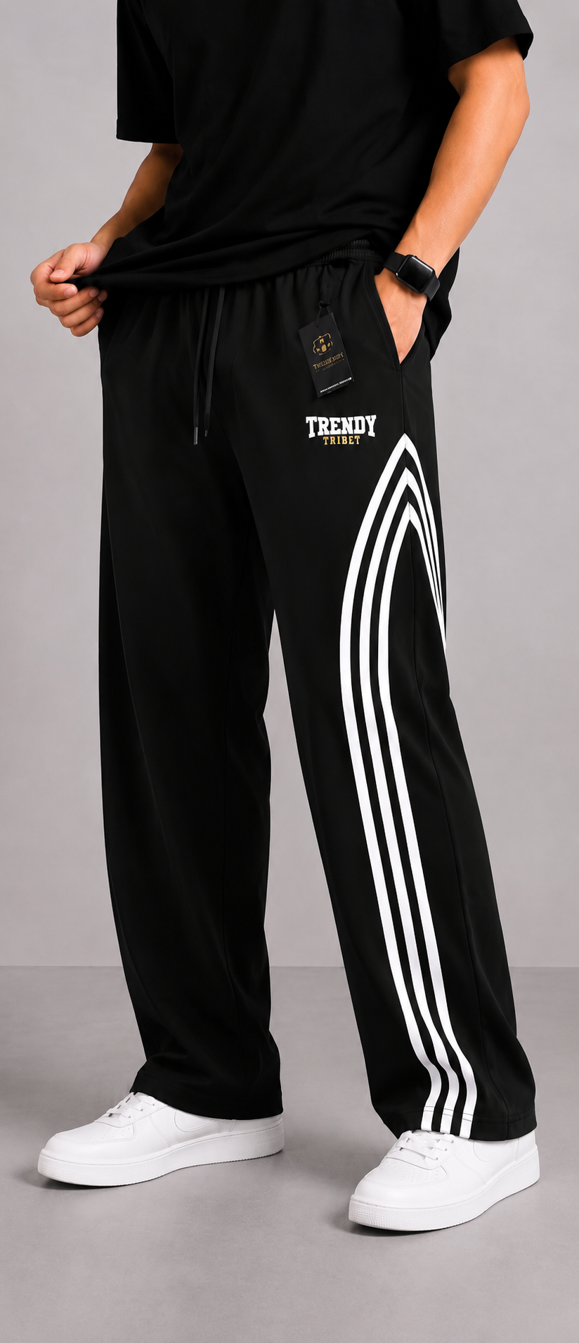 Men’s black wide leg track trousers with white side stripes, elastic waistband and Trendy Tribe logo