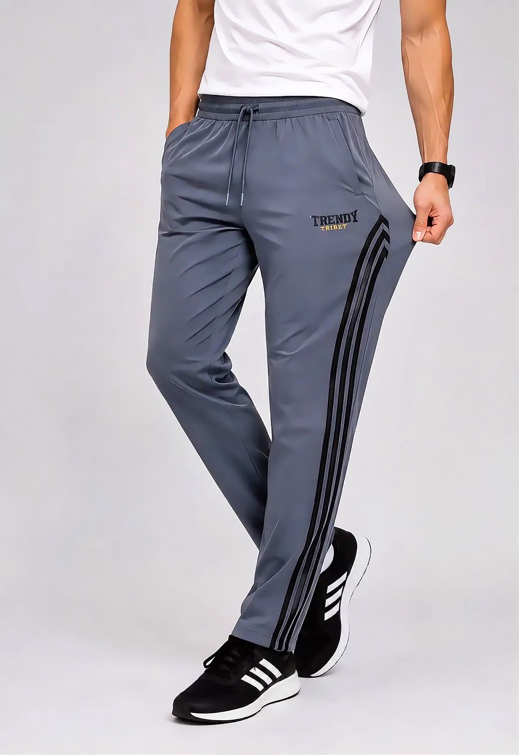 Men's dark grey sporty track trousers with black stripes